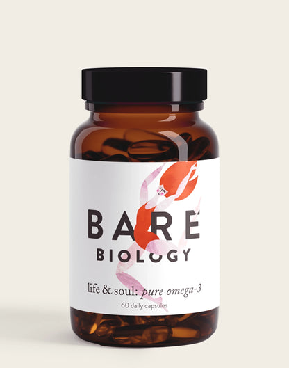 The brown bottle with a black cap labeled Life & Soul Omega-3 Fish Oil Daily Capsules by Bare Biology contains 60 capsules. Its minimalist label has abstract red and pink shapes.